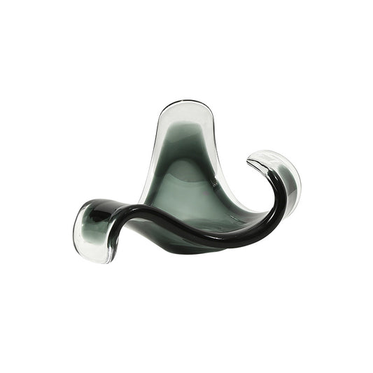 Modern glass sculpture on a white background